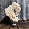 Calciet druzy op zwarte stalen voet - Thumbnail Image 1